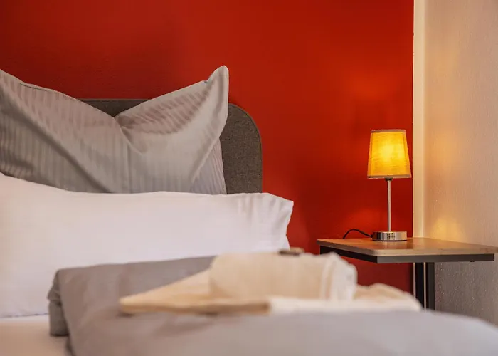 Апартаменты Moderne Maisonette Mit Garten Унтершлайсхайм