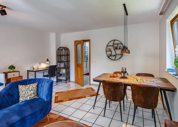 Апартаменты Moderne Maisonette Mit Garten Унтершлайсхайм